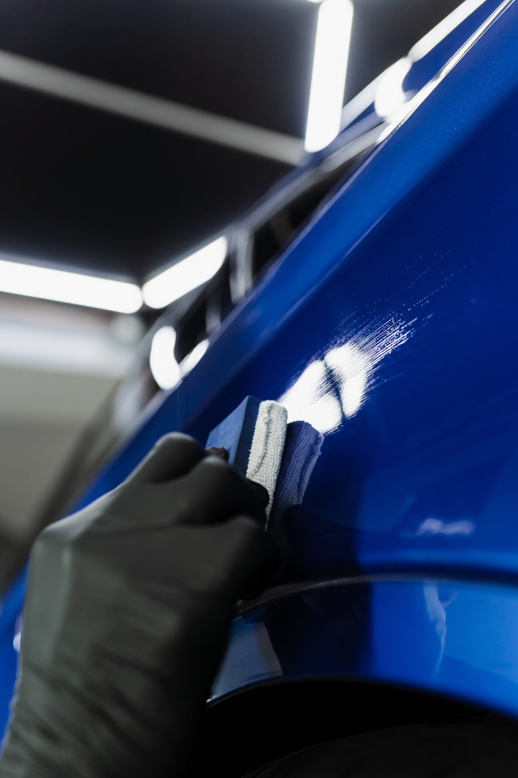 hand-applying-nano-ceramic-protective-coat-protect-car-from-scratches-process-apply-ceramic-layer-body-car-using-sponge-closeup-detailing-auto-service-1-scaled.jpg