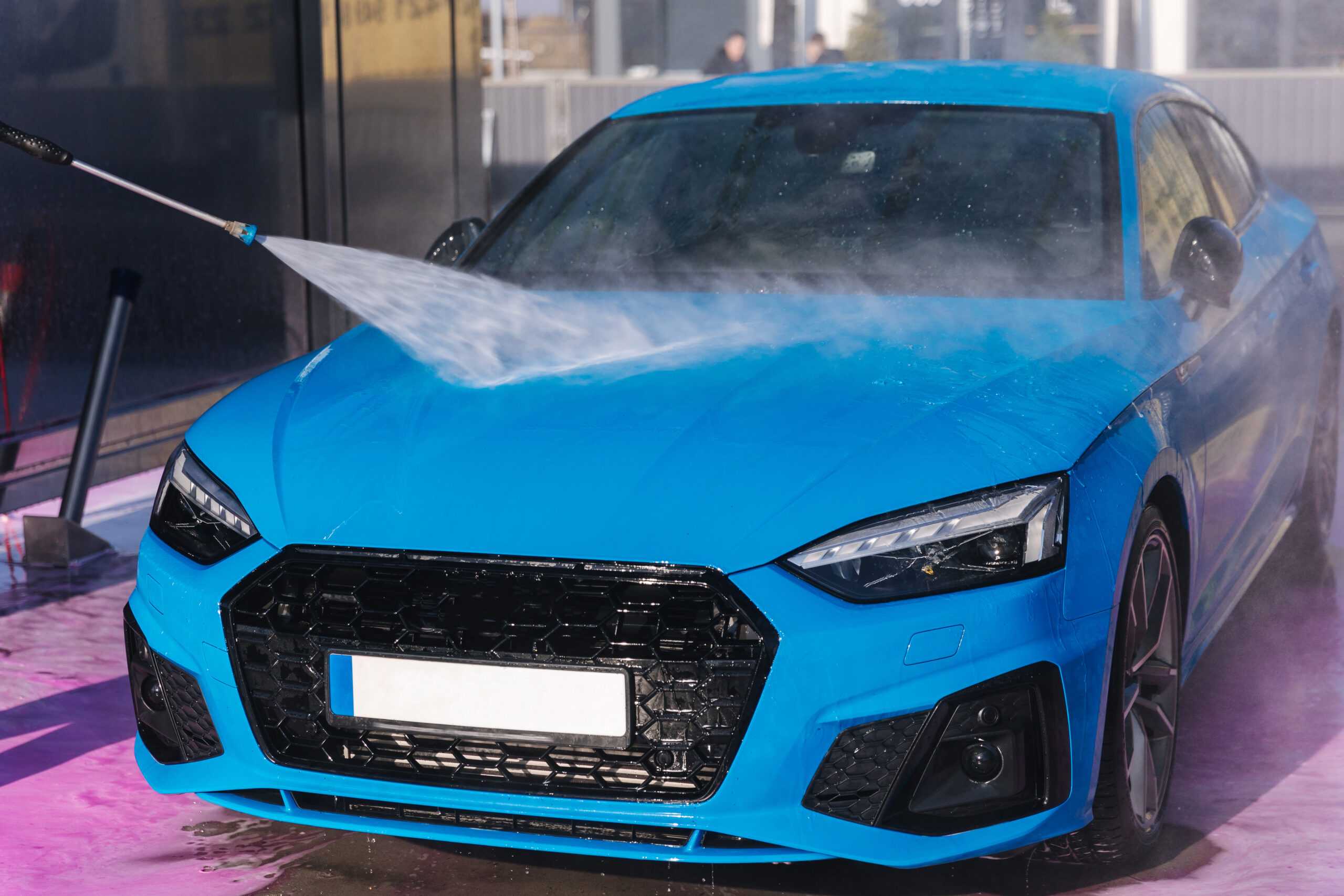 worker-cleaning-car-using-high-pressure-water-self-servise-car-washing-clean-auto-1-scaled.jpg